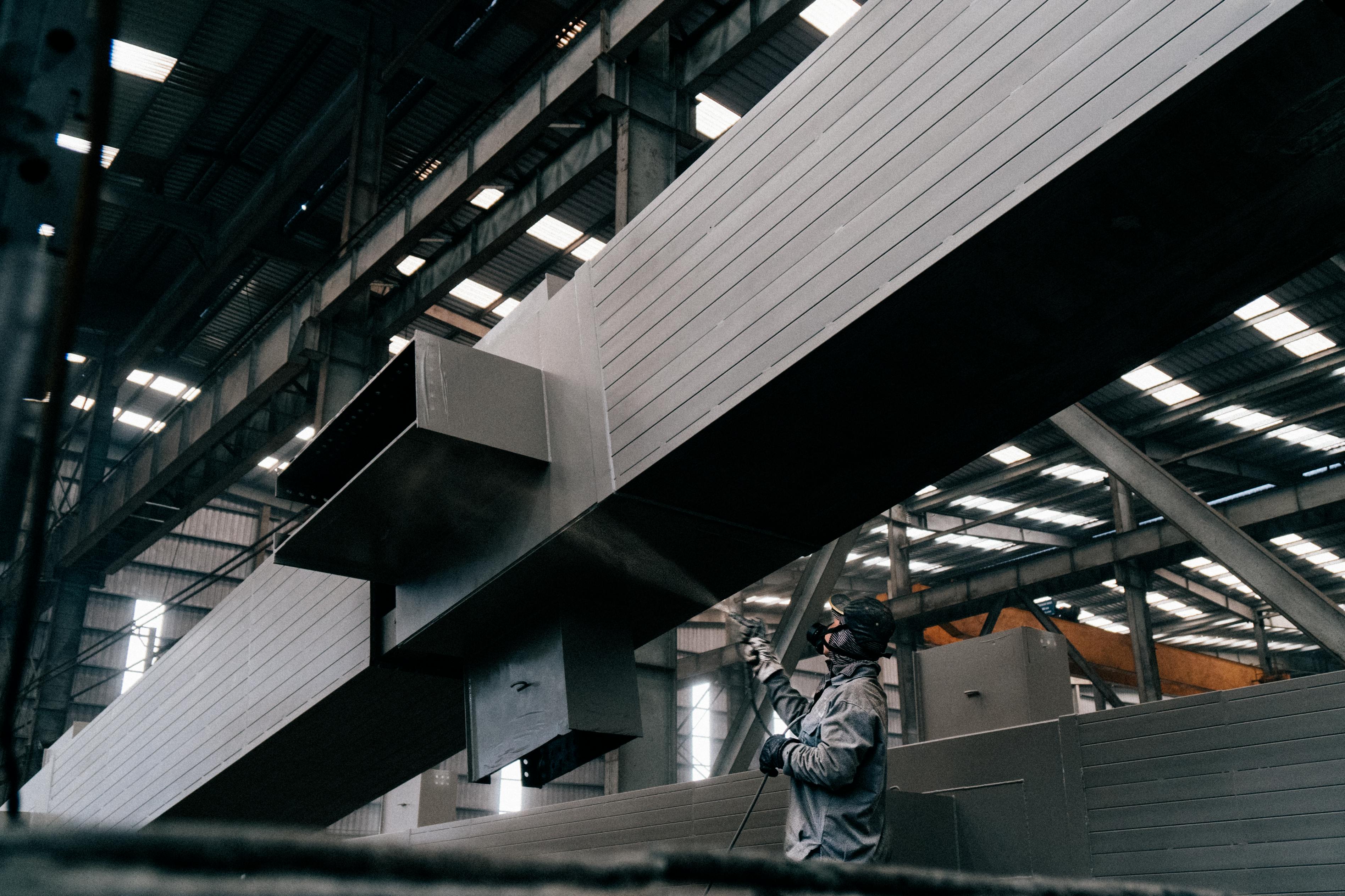 Industrial coating of structural steel beams